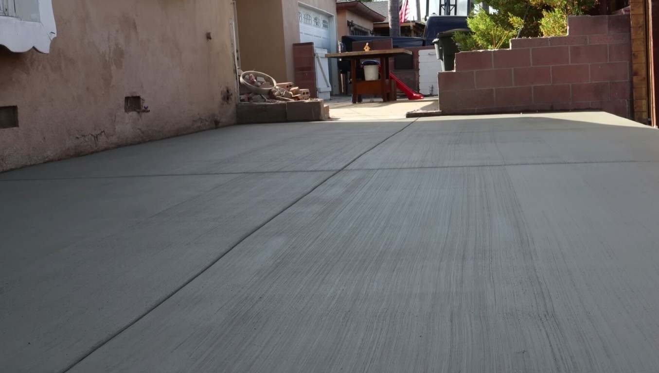 Freshly finished concrete flatwork and sidewalk installation